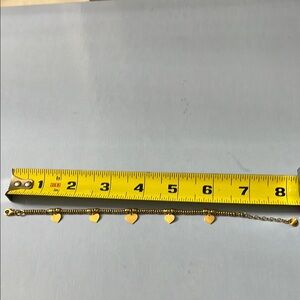 Gold Heart dangling beaded Charm Bracelet